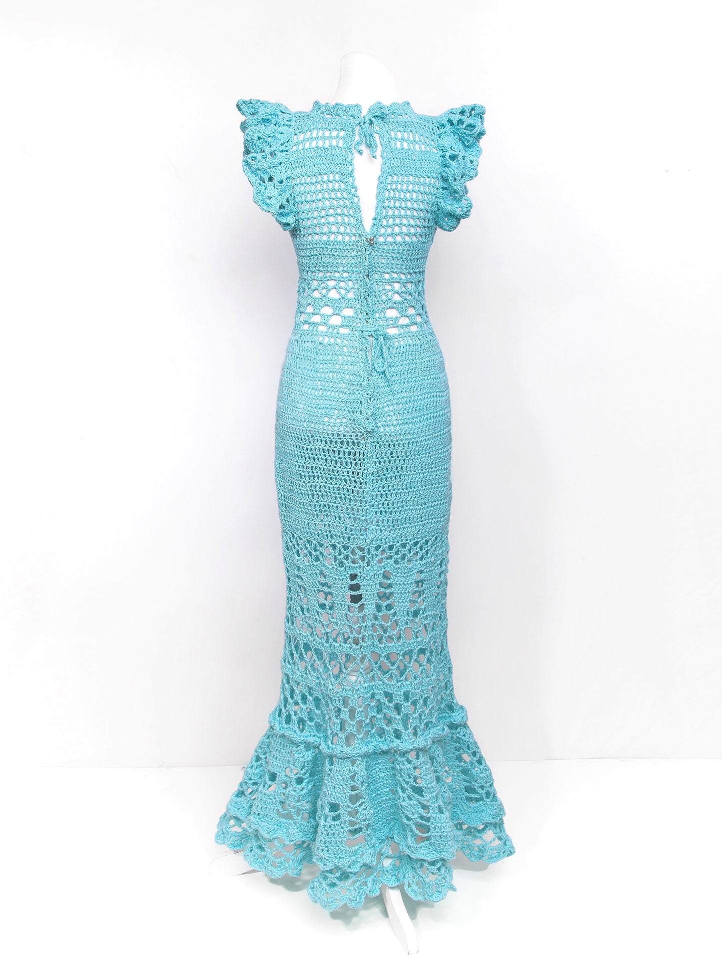 Blossom Crochet Maxi Dress in turquoise with ruffled sleeves, fitted bodice, and intricate lace pattern throughout the length