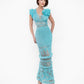 Blossom Crochet Maxi Dress in turquoise with delicate lace pattern, ruffled sleeves and tiered skirt design