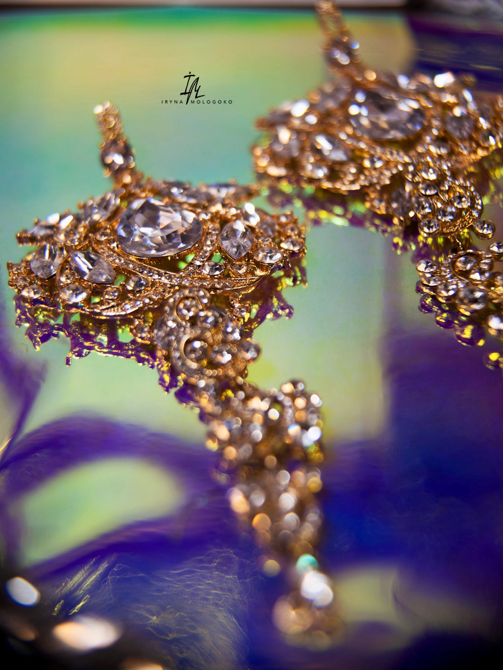 Amily Extra Large Dangle Statement Earrings featuring ornate gold-tone chandelier design with sparkling crystal details