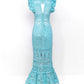 Blossom Crochet Maxi Dress in turquoise with ruffled sleeves, fitted bodice, and intricate lace pattern throughout the length