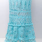 Blossom Crochet Maxi Dress in turquoise cotton featuring intricate lace pattern with tiered ruffles and delicate openwork design
