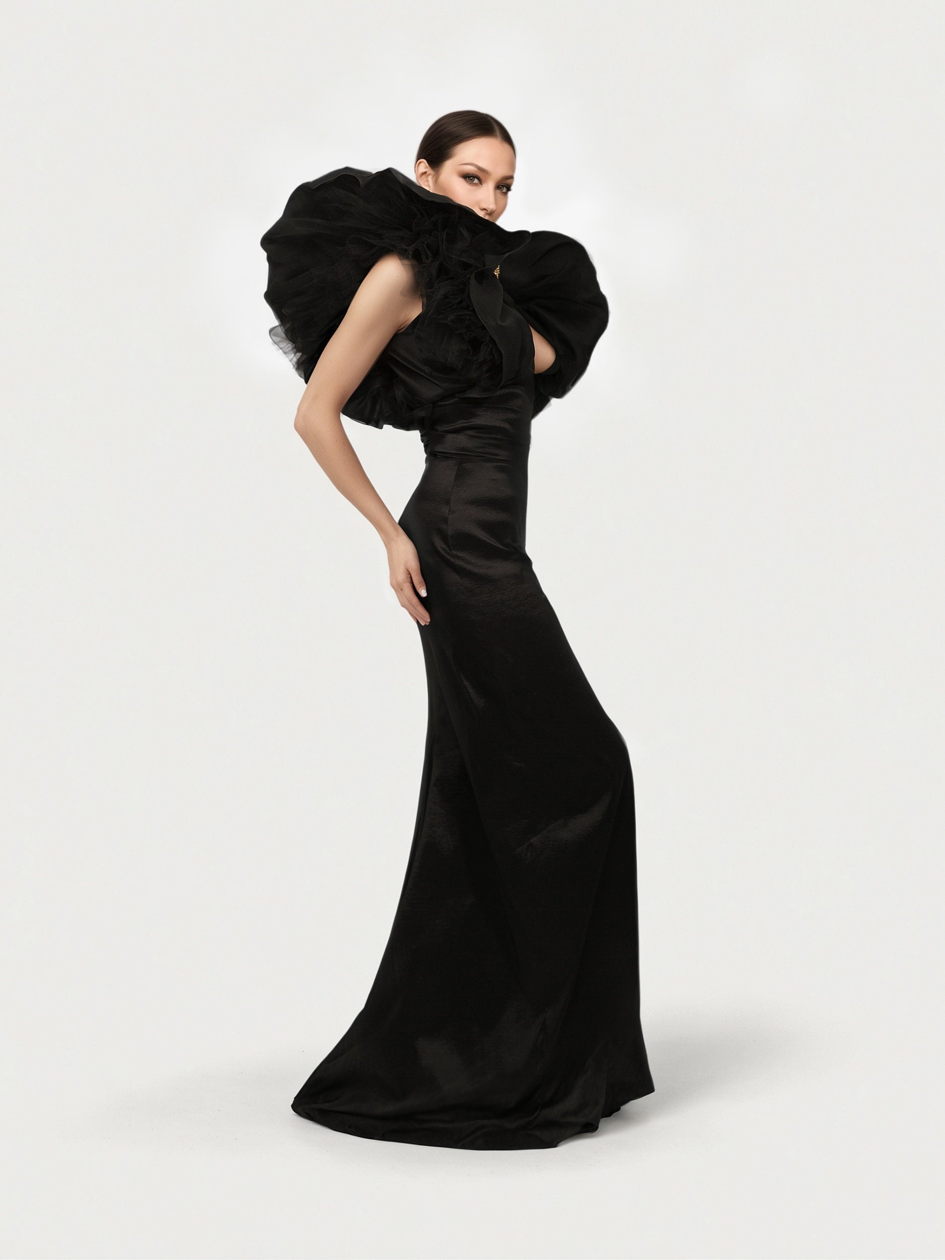 Black and White Monique Gown with dramatic ruffled sleeves and fitted silhouette featuring elegant bow detail