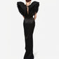 Black and White Monique Gown with dramatic ruffled shoulders and open back, shown from behind in elegant floor-length silhouette