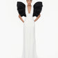 Black and White Monique Gown featuring dramatic black ruffled sleeves and plunging neckline on white floor-length dress