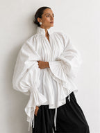 The Ethereal Plissé Poet Blouse